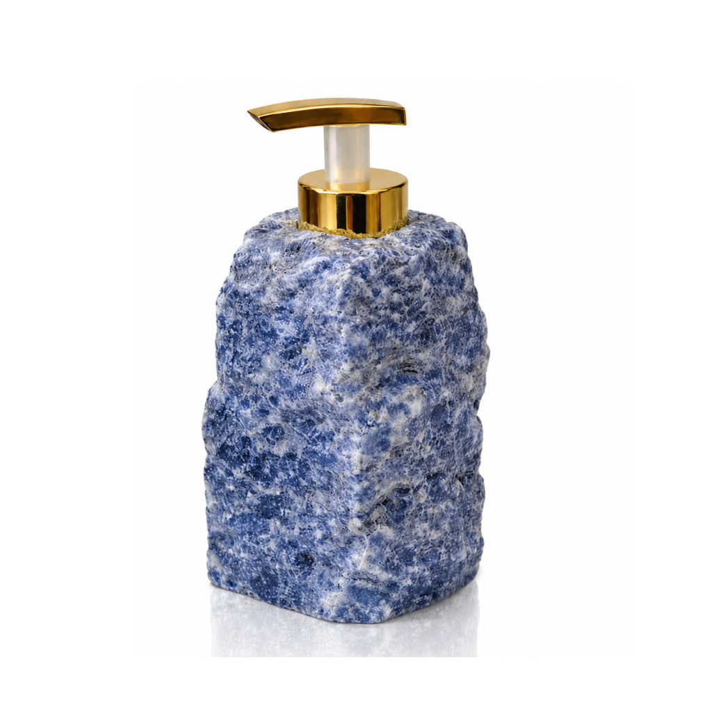 Raw blue sodalite soap dispenser with gold pump on white background